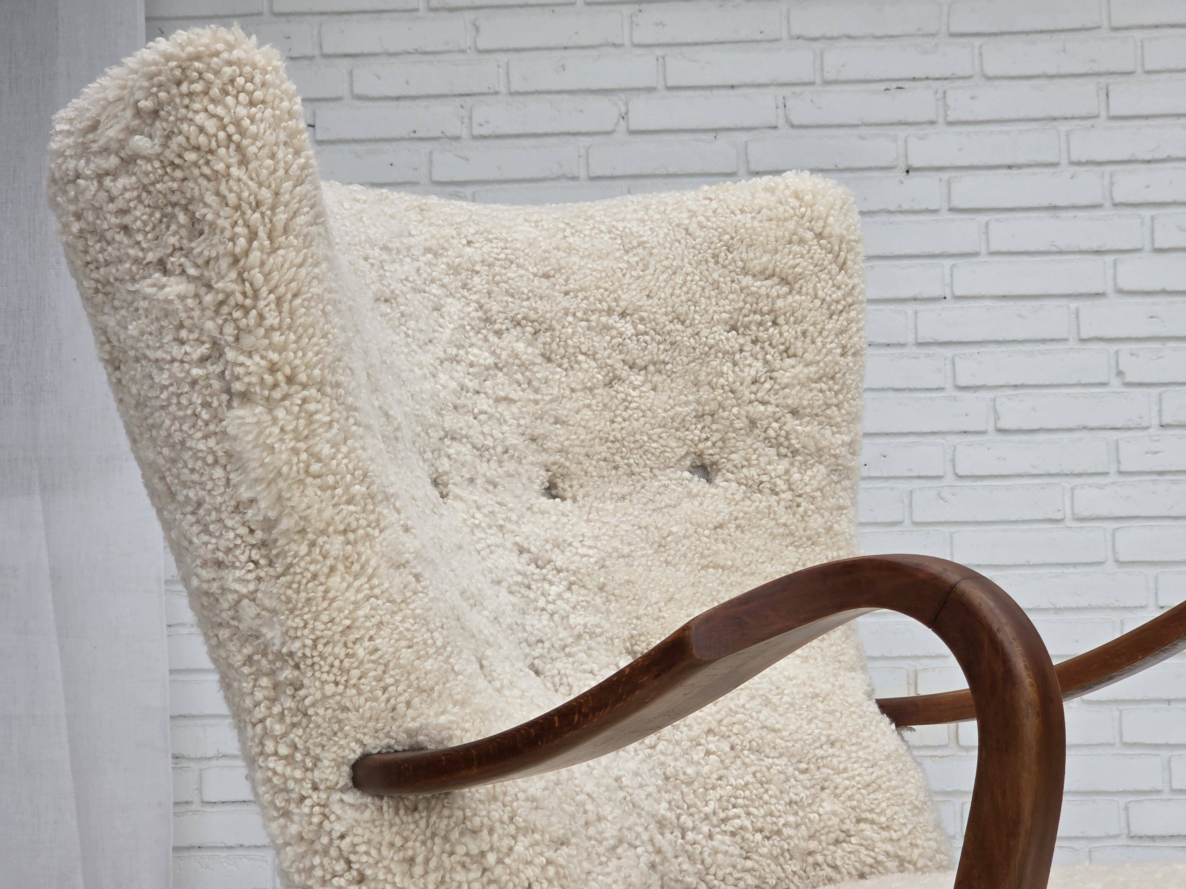 1960s, Danish design by Alfred Christensen, reupholstered, sheepskin.