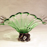 Glass cup on decorated metal stand