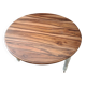 Round walnut table convertible into a console.
