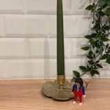 Brass candle holder on frame