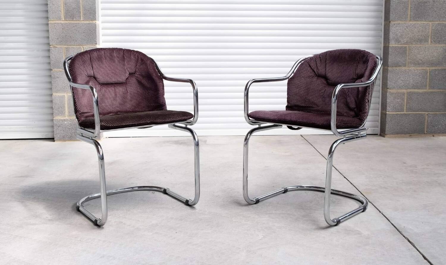 Pair of vintage Rinaldi style chrome chairs