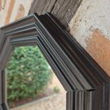 Octagonal black wood mirror