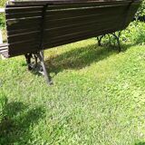 Old wooden bench and wrought iron