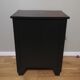 Chest of drawers 4 drawers in walnut and blackened wood.