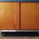2-door sliding furniture in the style of F. Knoll, veneered teak.