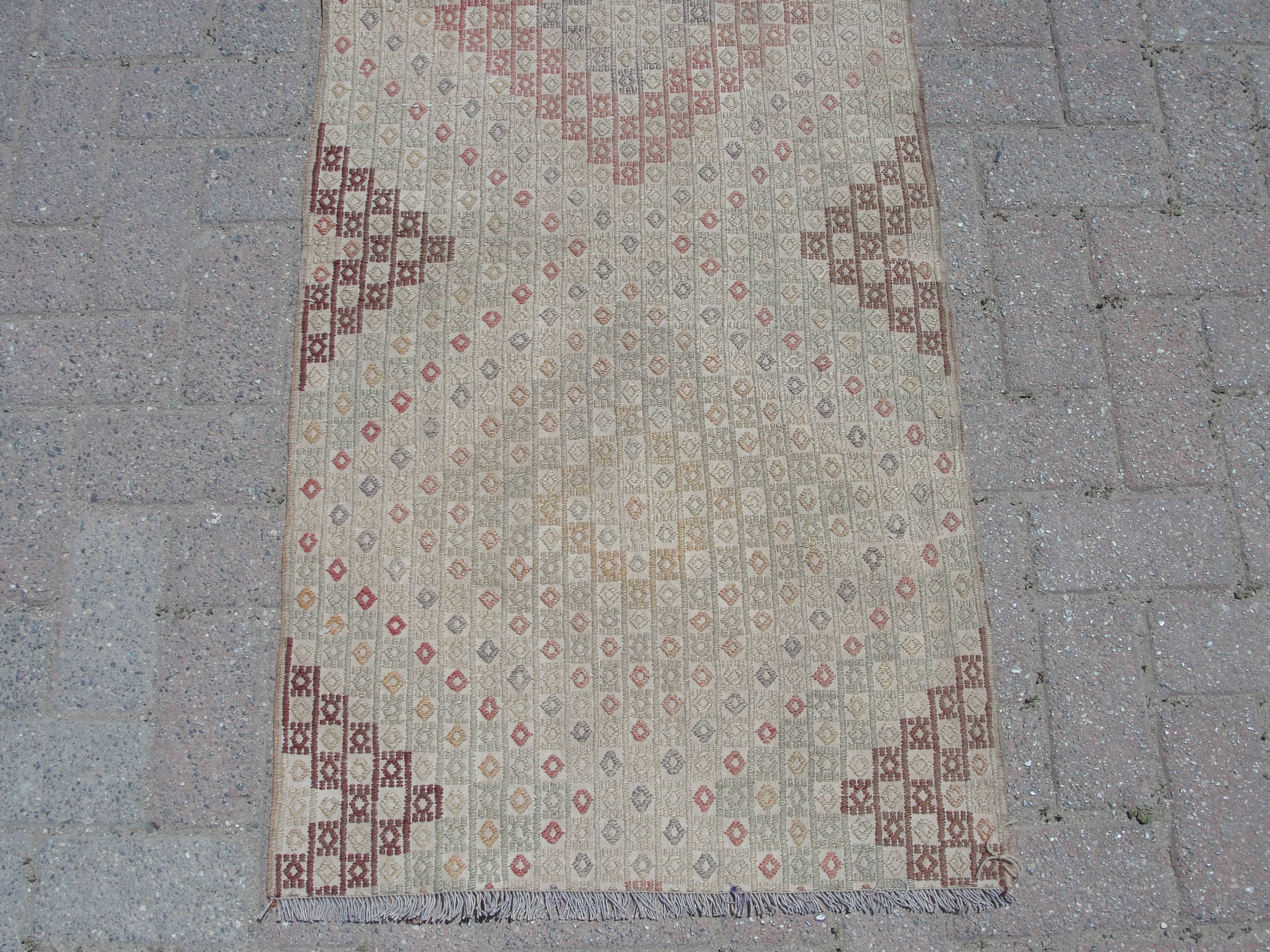 Handmade small kilim rug 64cm x 122cm