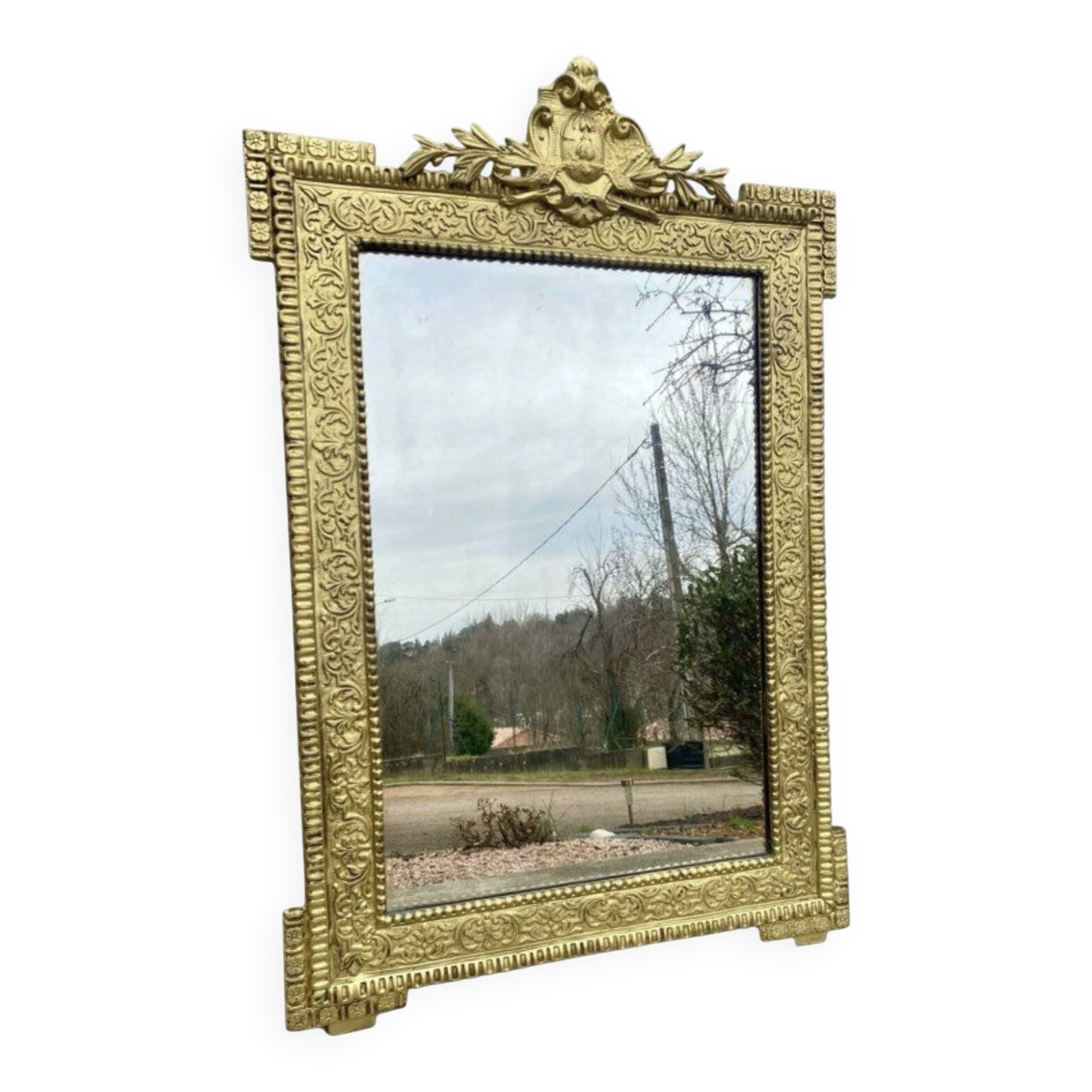 19th-century antique mirror in carved gilded wood, Napoleon style.