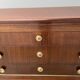 Empire style chest of drawers with gooseneck