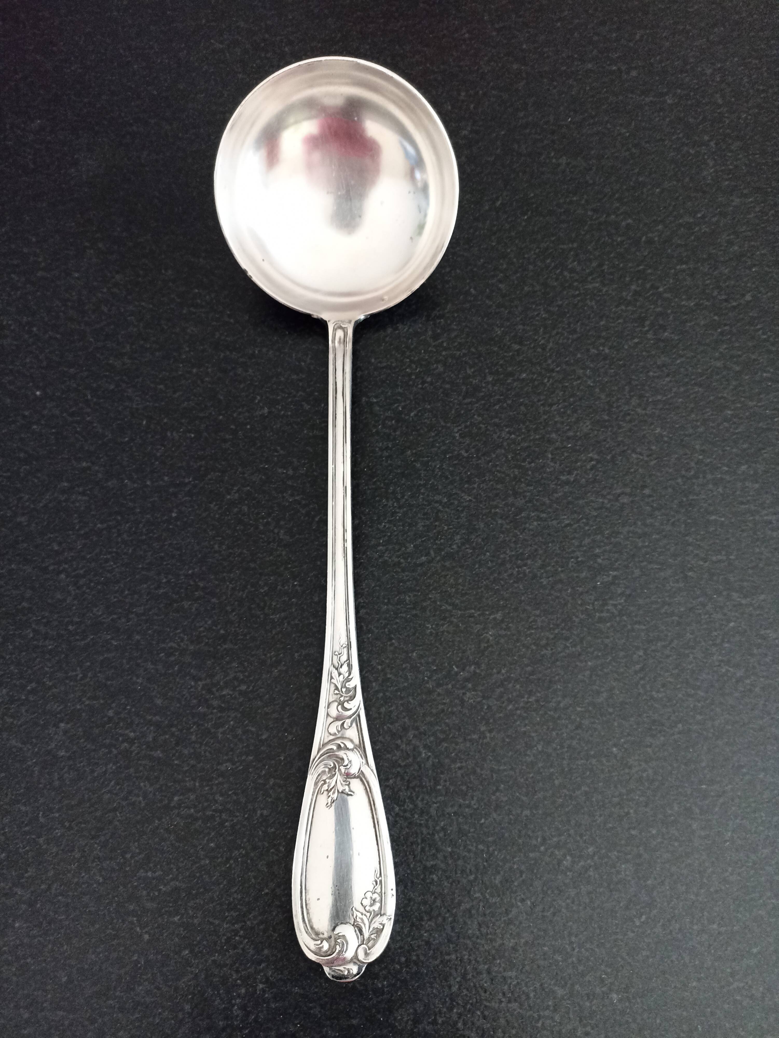 Silver metal ladle