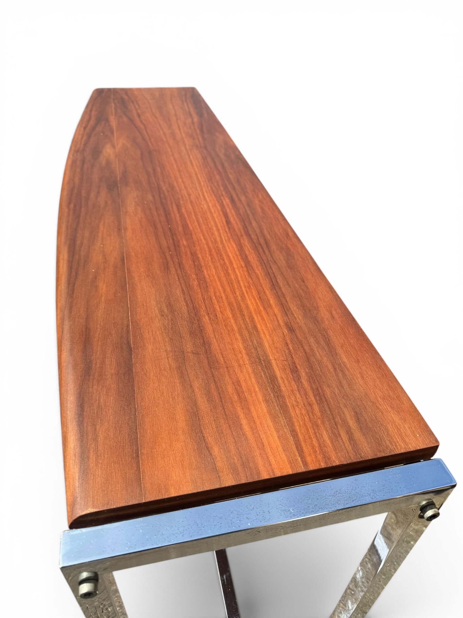 Curved base console in Scandinavian design – mahogany and chrome