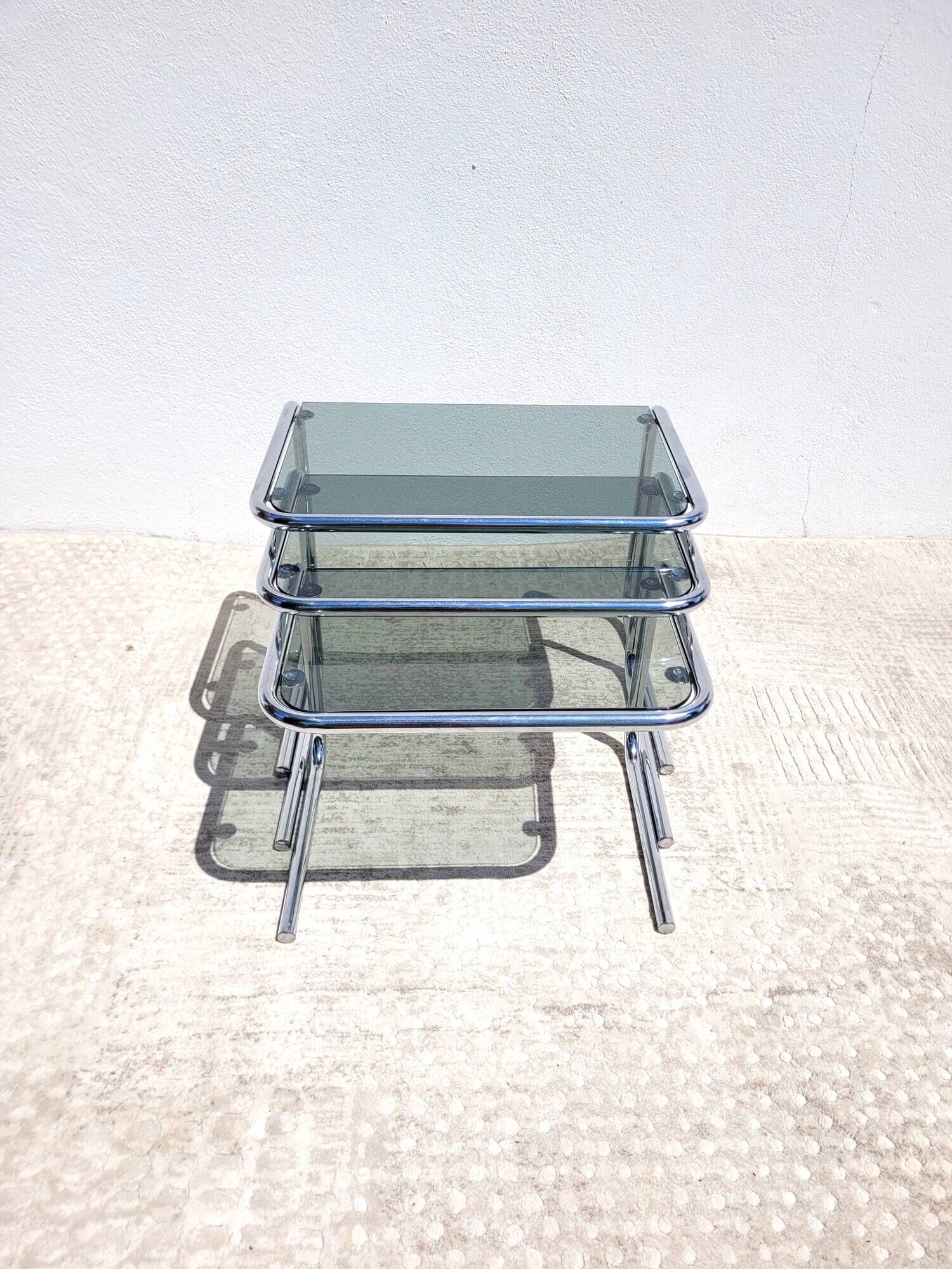 Vintage nesting coffee tables in chrome and smoked glass