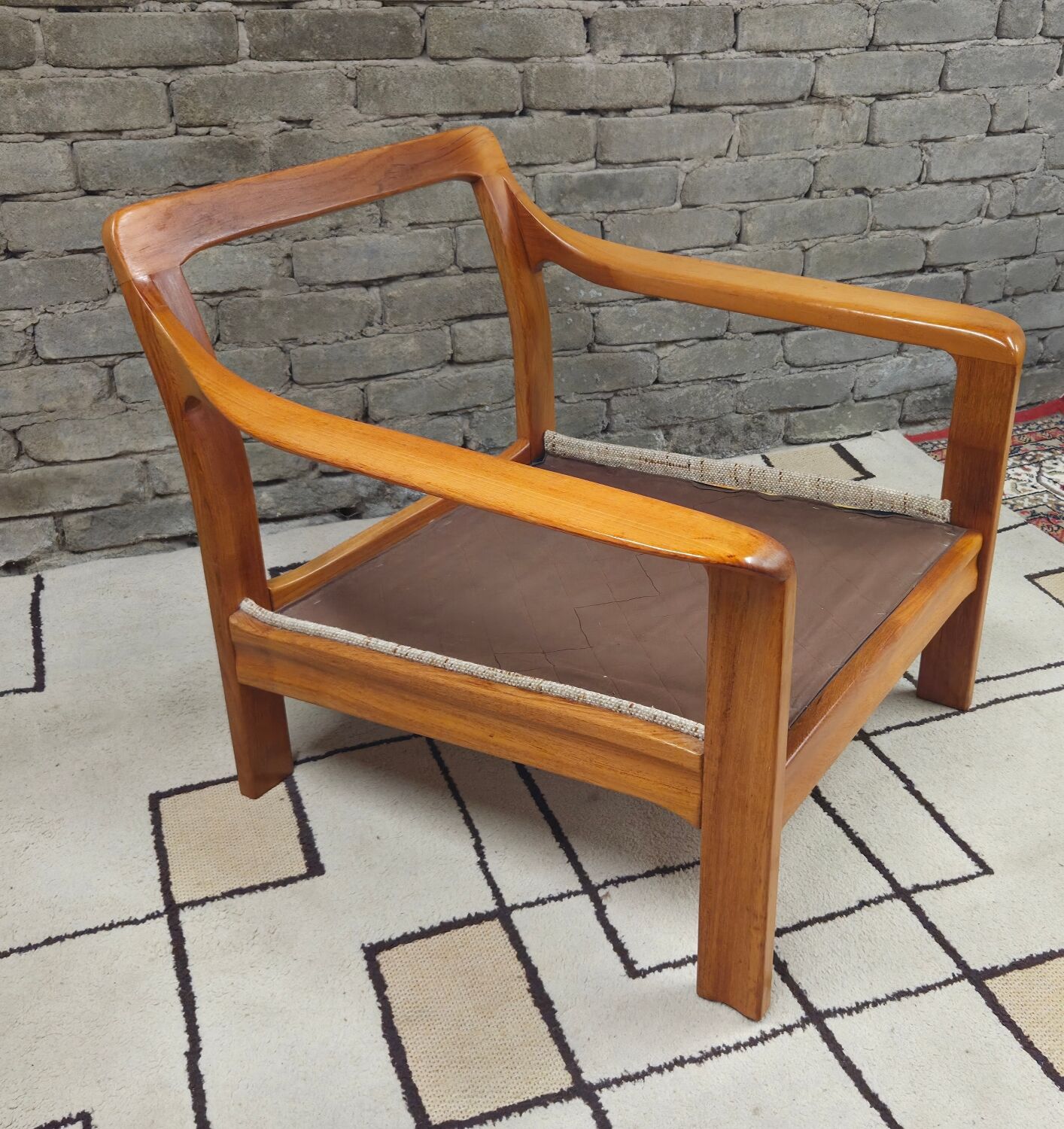 Danish canapé and its 1970s teak armchair
