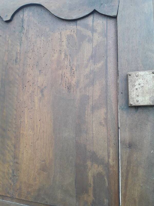 Bonnetière, standing man, Louis XV, 18th century walnut