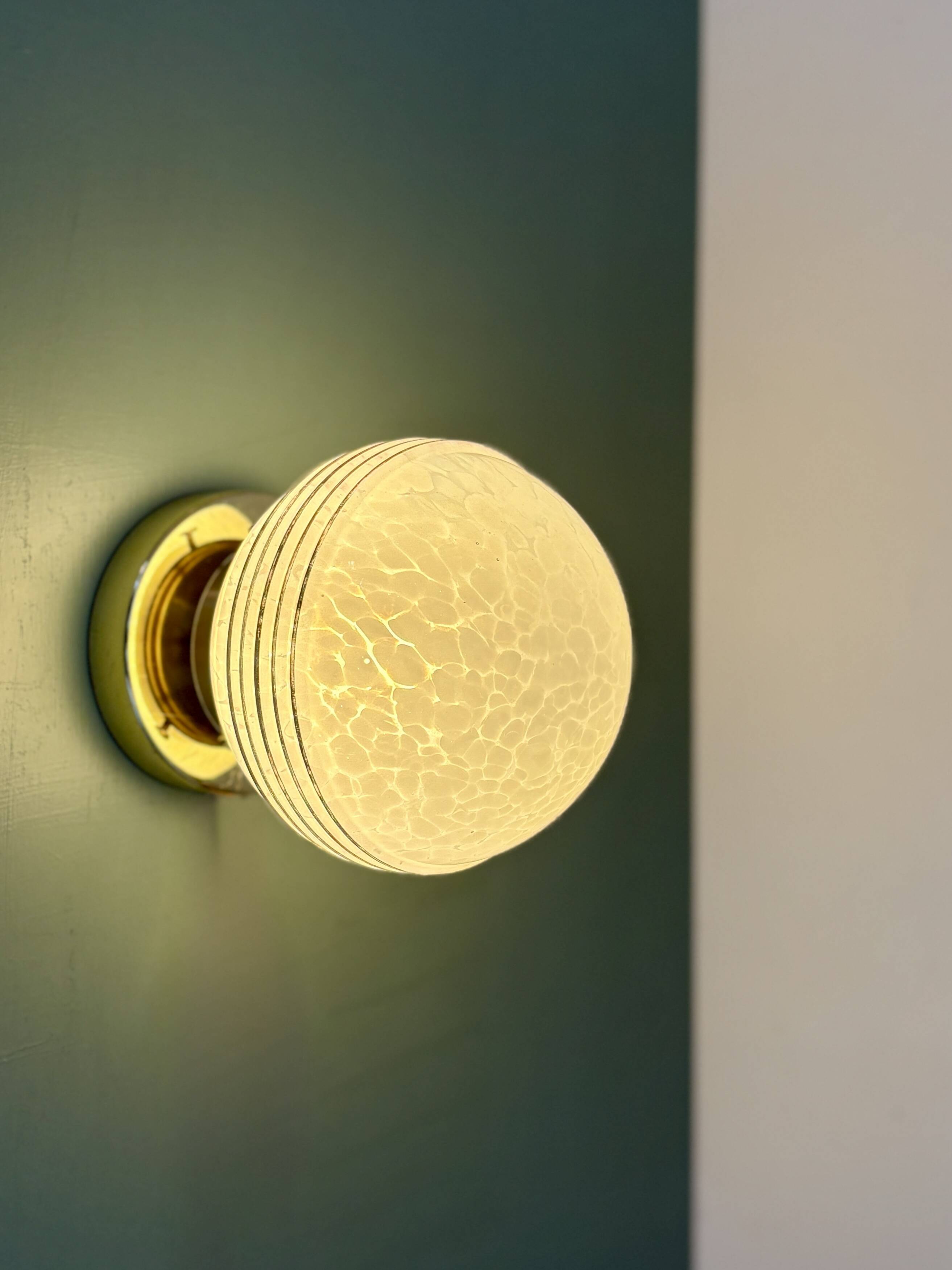 Vintage glass globe wall or ceiling light in white and gold from Clichy.