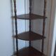 Corner shelf on wooden legs