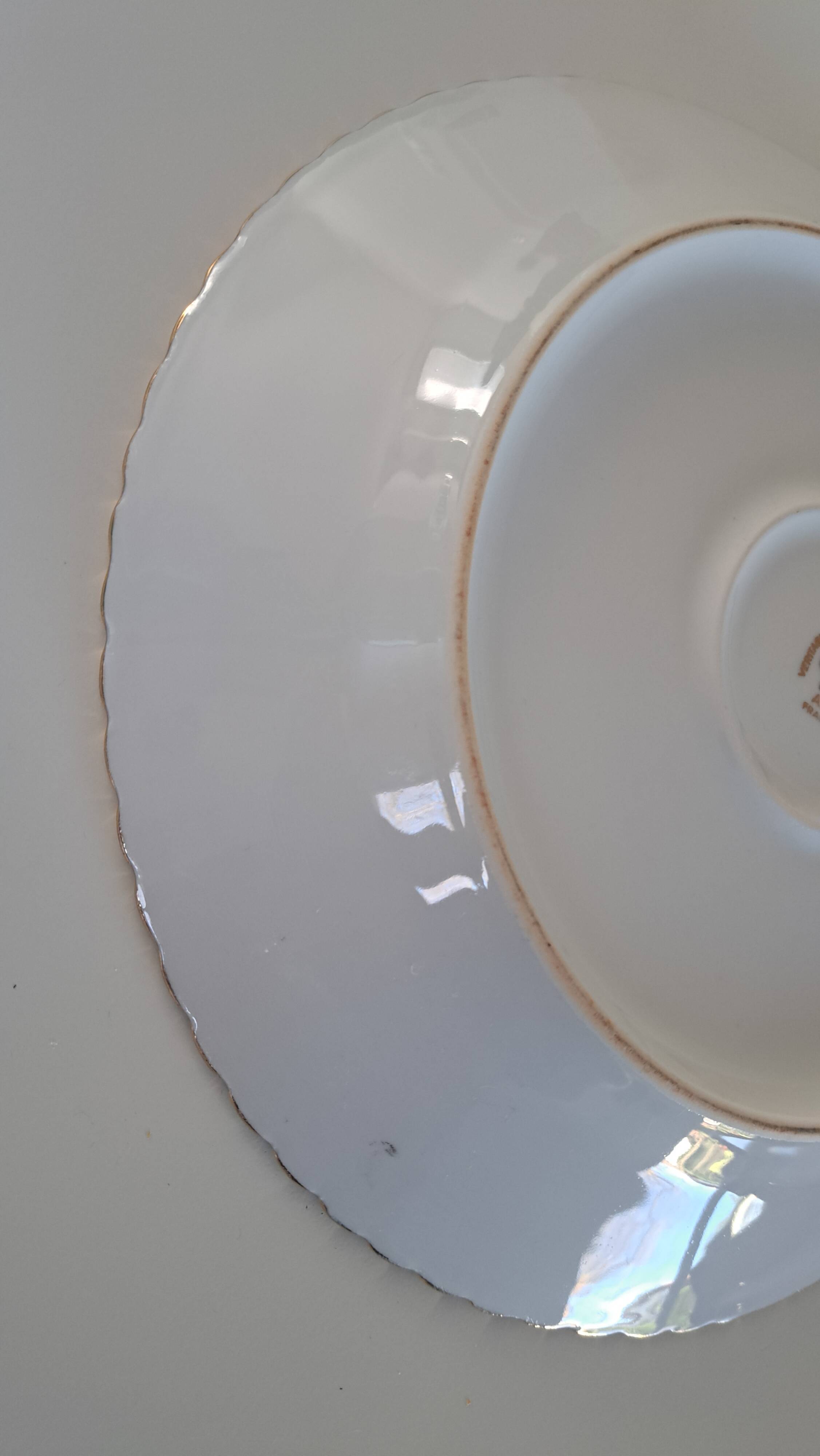 Gold-gilded Limoges porcelain plate