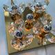 Brass wall lamp with glass prisms
