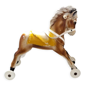 Ancien cheval jouet à roulette cheval entièrement en plastique vintage