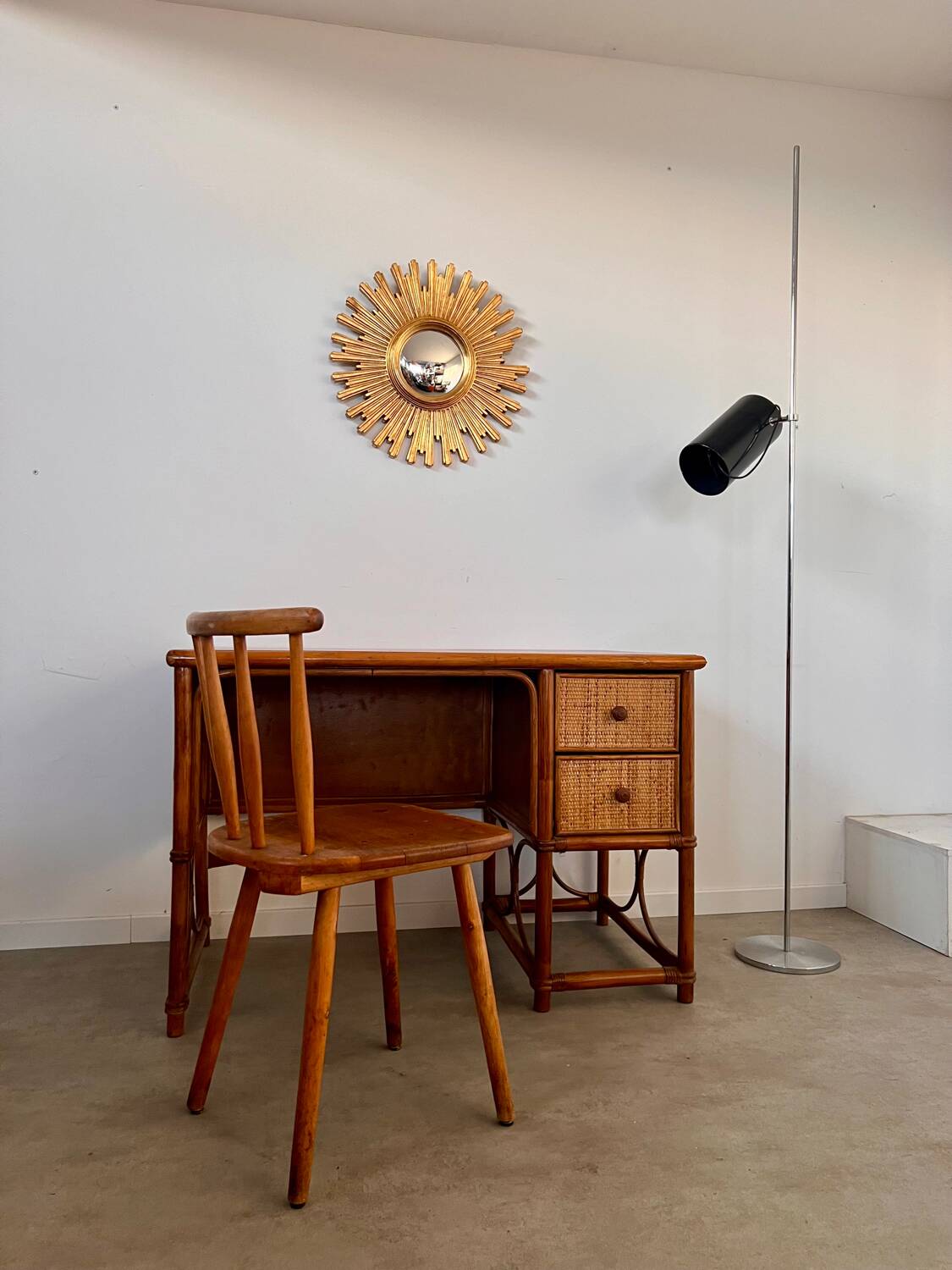 Old large golden sun mirror with rounded witch's eye in vintage resin from the 70s