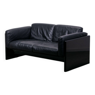 Simone 2 seat sofa by Simon International in black leather with high gloss frame
