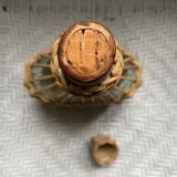 Wicker-sheathed glass bottle