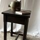 Wooden side table with secret storage