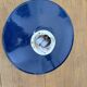 Antique wall light in blue enamel, workshop style.