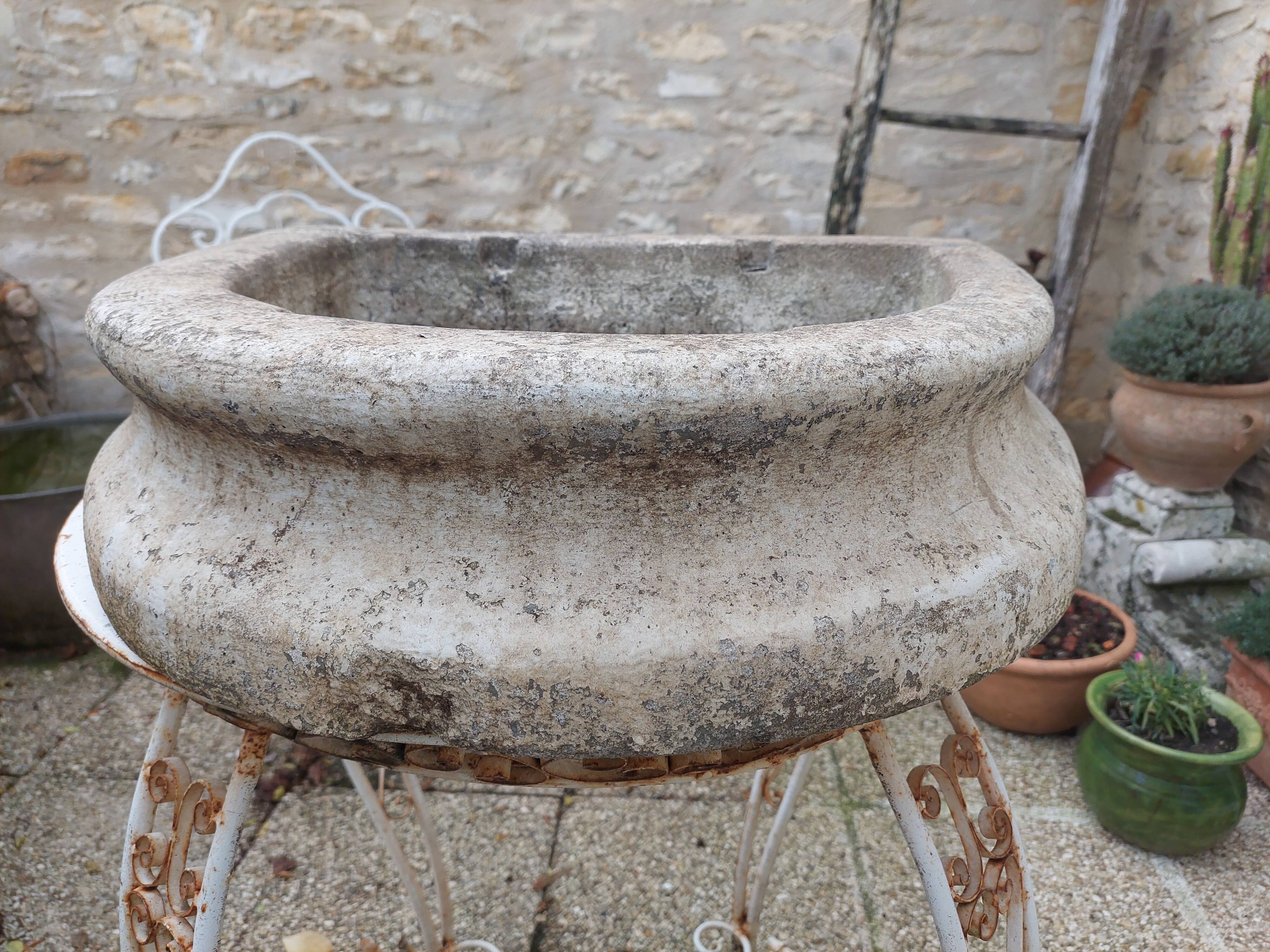 Reconstituted stone sink from the early 20th century.