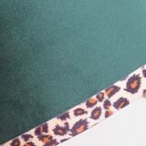 Vintage brass table lamp with green velvet shade.