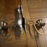 Two candlestick sconces