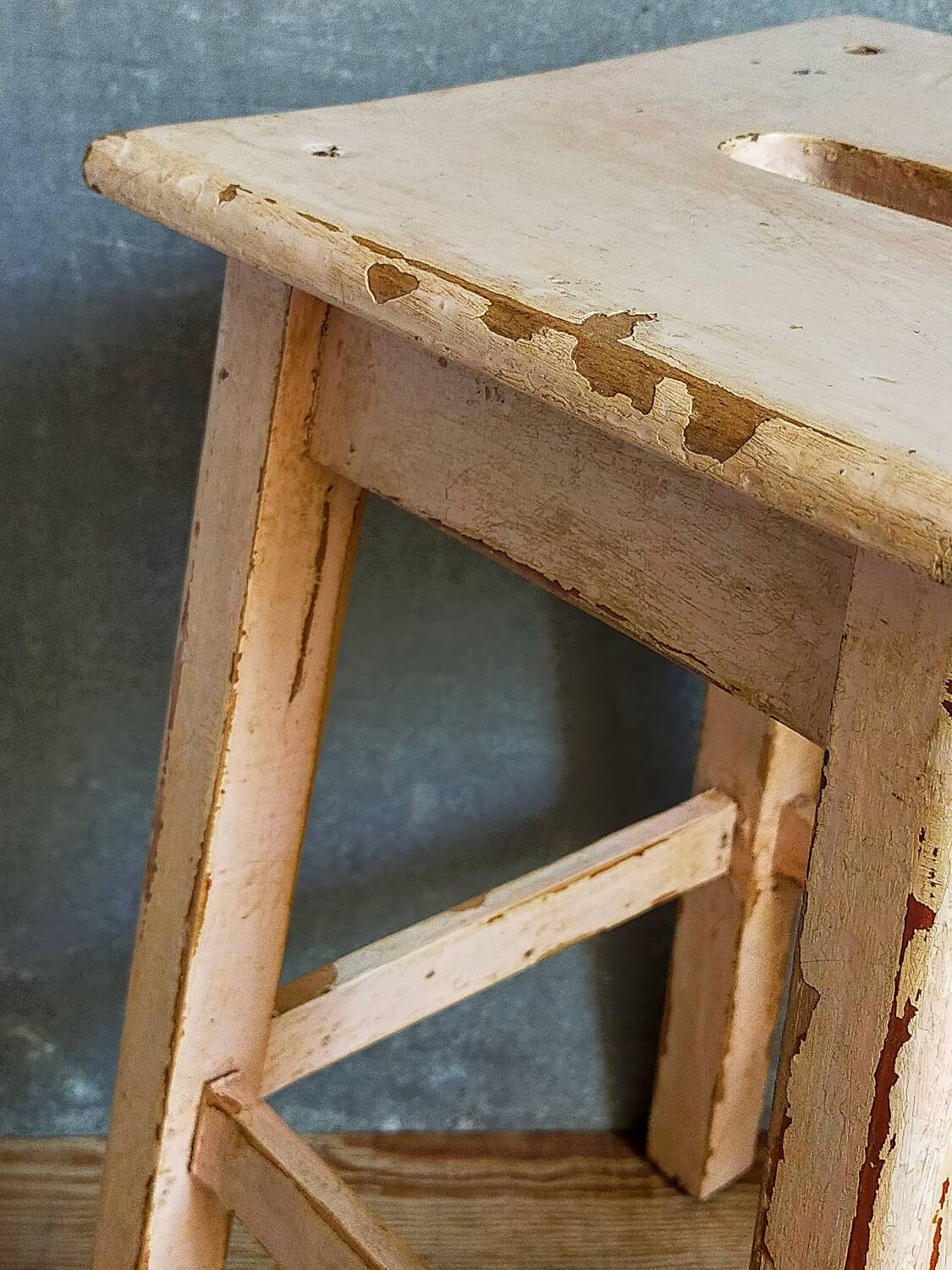 Antique workshop stool in patinated solid wood