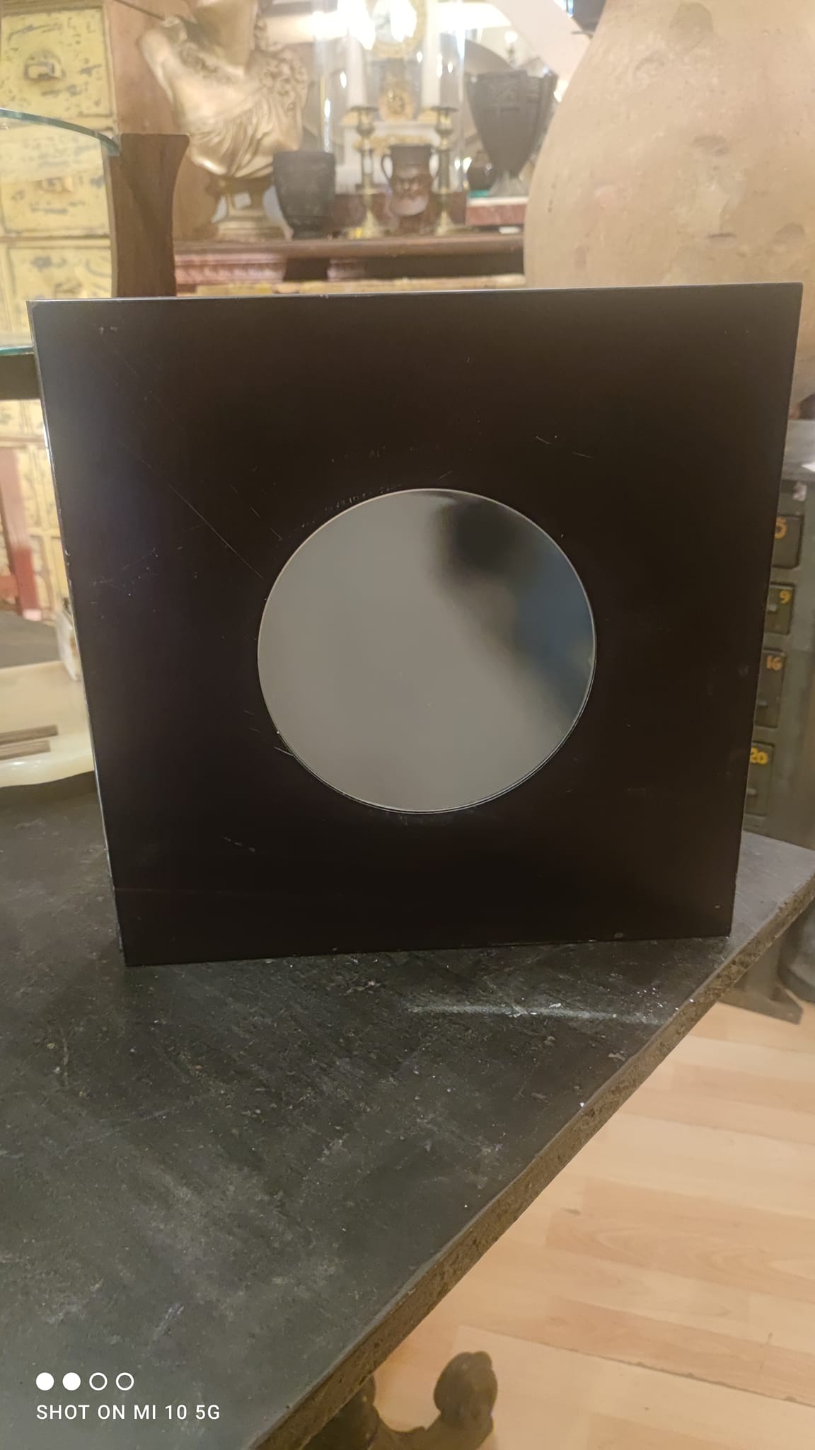 Wall mirror with a wooden frame and Wenge finish, dating from the late 19th century