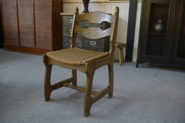 Set of 6 oak dining chairs with rush seat and 'Echelle' backrest in the style of Guillerme et Chambron 1950s