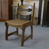 Set of 6 oak dining chairs with rush seat and 'Echelle' backrest in the style of Guillerme et Chambron 1950s