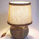 Flattened ball ceramic lamp