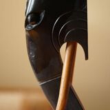 Side table in hardwood ebony with three elephant head-shaped legs, Eastern India, 1920s.