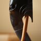 Side table in hardwood ebony with three elephant head-shaped legs, Eastern India, 1920s.