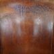 Fauteuil club vintage couleur cognac en cuir de mouton