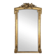 Large gilded wooden mirror in Louis XVI style from the late 19th century.