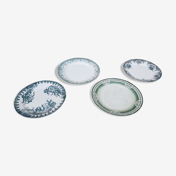 Series of 4 mismatched floral decoration plates