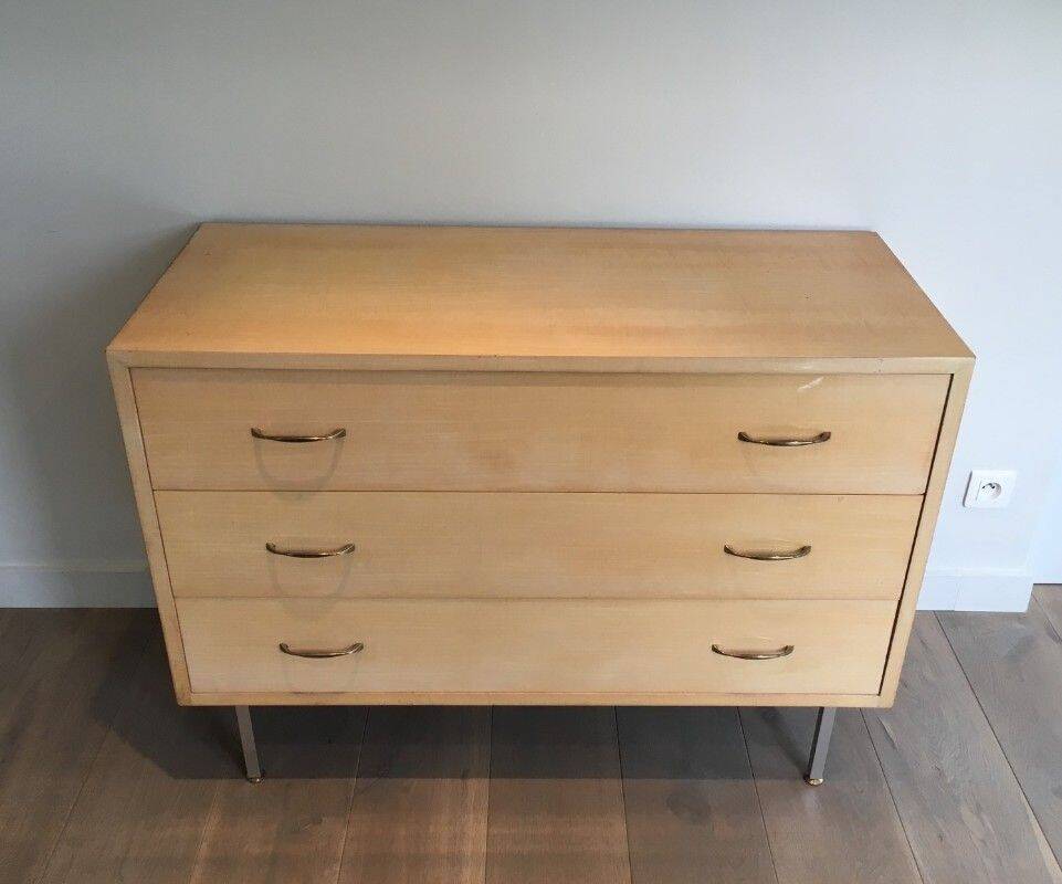 Eggshell lacquered chest of drawers with brushed steel legs. In the style of Knoll.