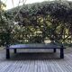 Table basse bois teinté noir brutaliste
