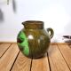 Vintage artisanal flowery ceramic pitcher vase