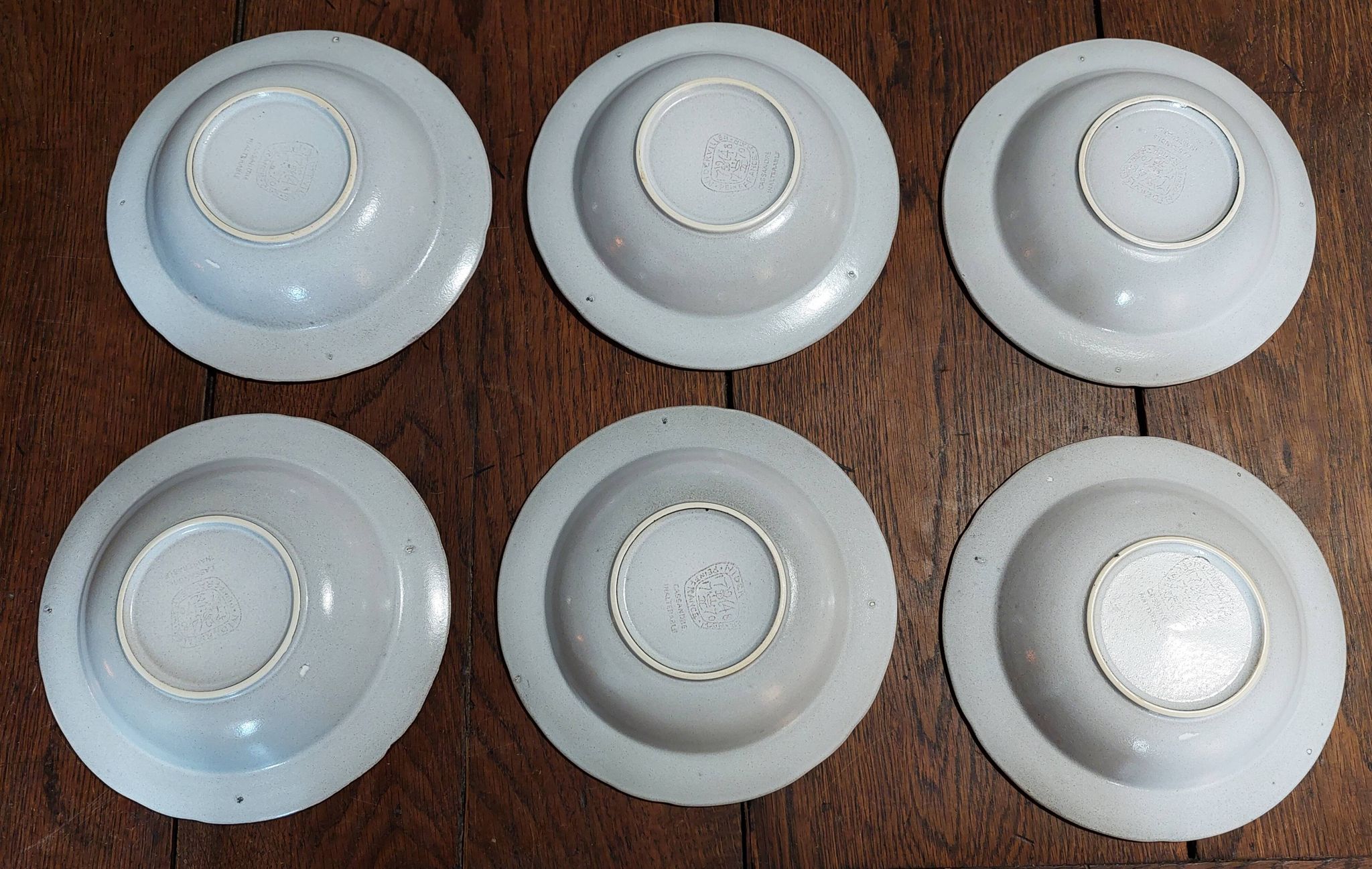 Assiettes creuses série de six grès Niderviller décor Cassandre XXème