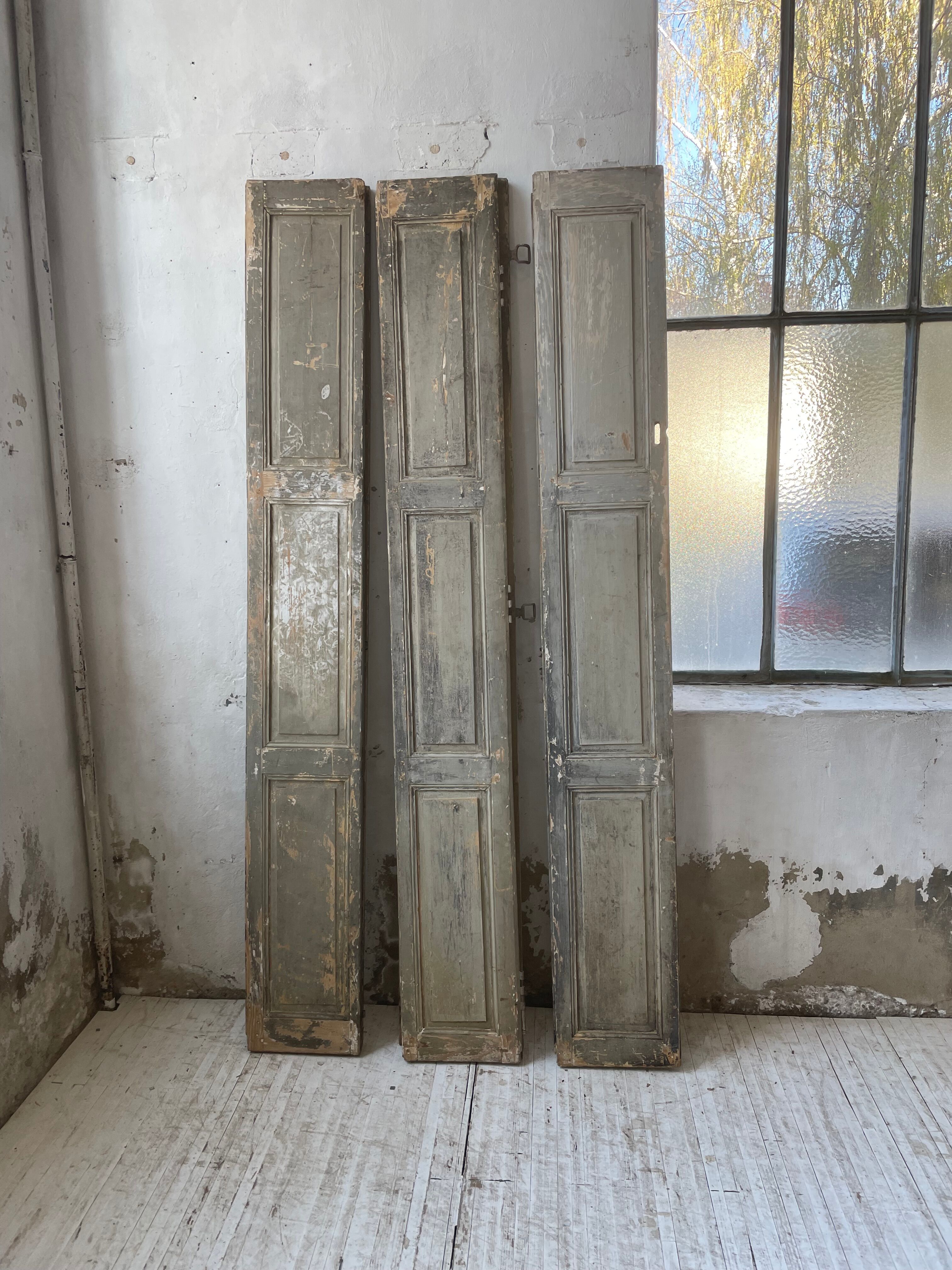 Trio of shutters louvers patina blue gray