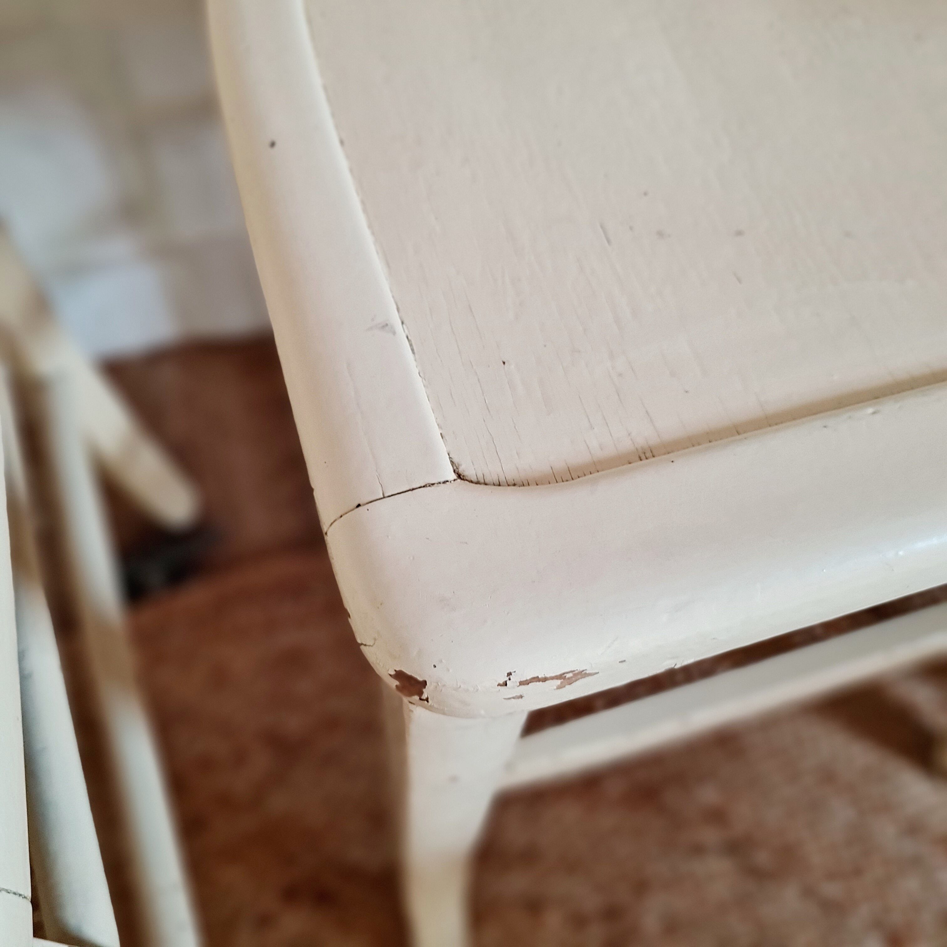 4 mismatched antique bistro chairs