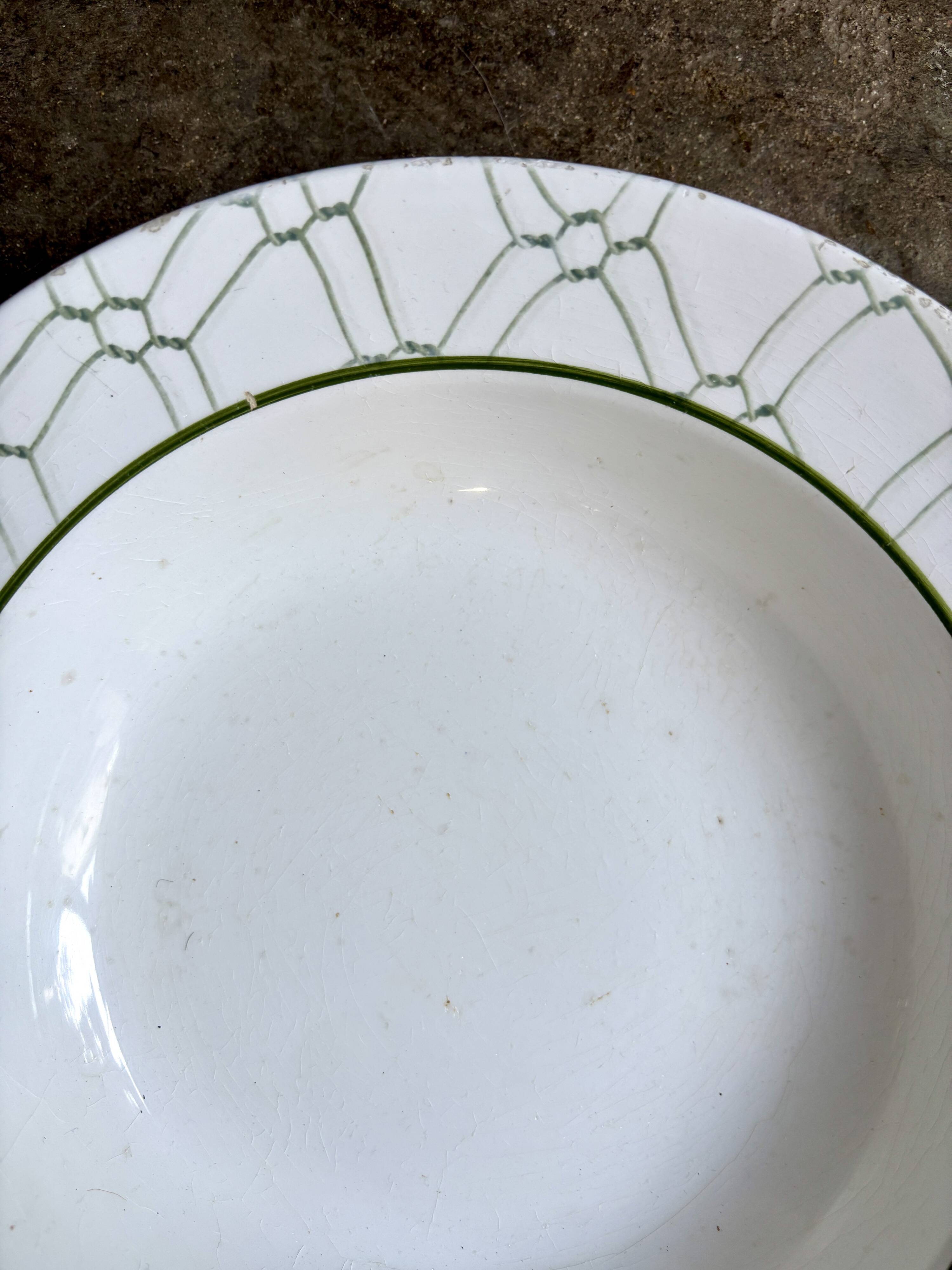 Small round hollow dish by Christian Dior in Italian earthenware