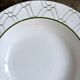Small round hollow dish by Christian Dior in Italian earthenware
