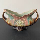 Old earthenware planter. Floral patterns.