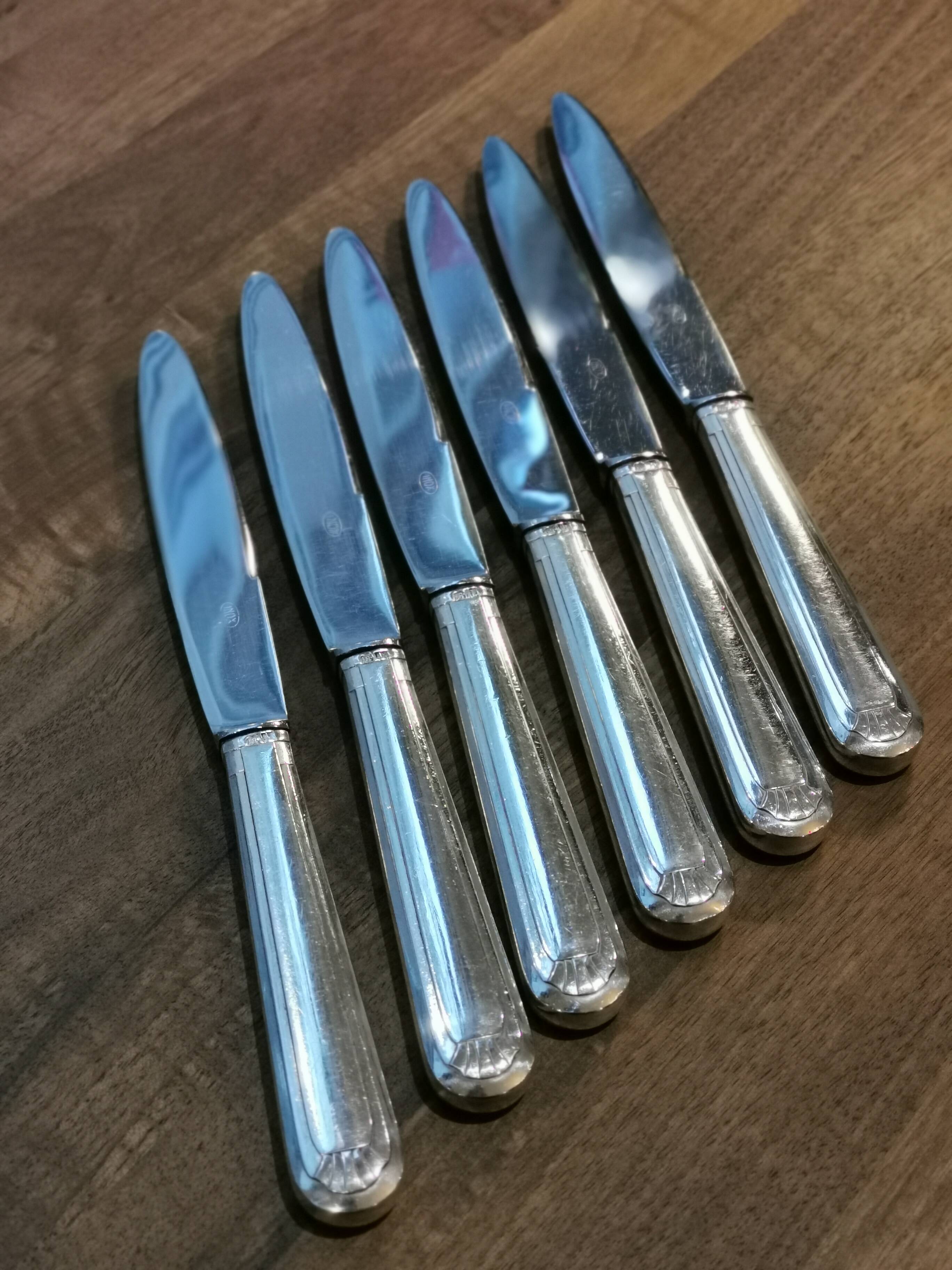 6 large silver metal knives